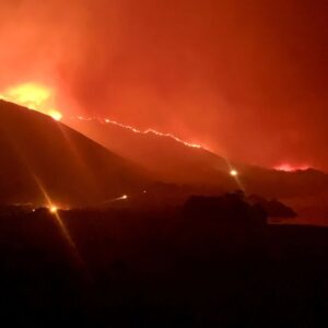 California wildfire triggers evacuations, closes highway